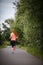 Young woman running outdoors on a lovely sunny winterl day