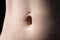 Young woman`s navel