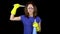 A young woman scratches her head with a toilet brush. Woman in safety glasses and gloves with tools for cleaning the