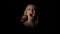 Young woman screaming in dark room, sense of despair, stress and life problems