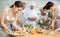 Young woman seasoning dish with sauce at group cooking class