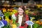 Young woman selecting fresh flowers