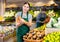 Young woman selling cassava in shop