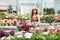 Young woman shopping in a large nursery