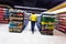 Young woman shopping in the supermarket ,motion blur