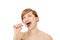 Young woman singing to tooth brush