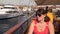 Young woman sitting on the outdoor deck of the yacht