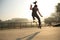 Young woman skateboarder skateboarding at skatepark