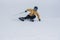 Young  woman skiing on a cloudy day in Andorra