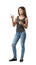 Young woman in sleeveless top and jeans standing in half-turn with both hands bent and index fingers pointing sideward