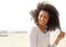 Young woman smiling with curly hair