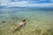 Young woman snorkeling in clear water on Taveuni Island, Fiji