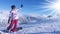 Young woman snowboarder in mountains