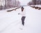 Young woman snowboarding