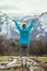 Young woman in sportswear is standing on a field, wonderful-gesture