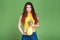Young woman with sporty body holding fruit pineapple on green background. Healthy food Lifestyle Sport Diet Eco Nutrition Healthca
