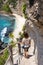 Young woman on the stairway to the beautiful diamond beach