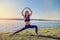 Young woman streching legs early morning before working time on outdoor