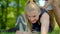 Young woman stretching outdoor. Stretching exercise in park