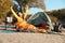 Young woman stretching in sleeping bag near camping tent