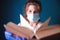 Young woman or student reading a book with protective mask and gloves for Corona Virus, Covid-19, Coronavirus. Stay at