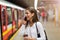 Young woman at subway station