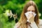 Young woman suffering spring pollen allergy