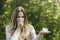 Young woman suffering spring pollen allergy