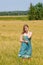 Young woman in summertime field