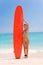 Young woman with surfboard