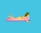 Young woman swimming floating on inflatable mattress