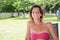 Young woman in swimsuit sit on garden chair summer day