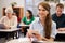 Young woman with tablet computer at an adult education class