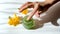 Young woman takes on hand natural green kiwi fruits scrub from glass jar