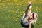 Young woman talking on the phone on the grass. Summer Concept