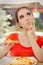 Young Woman Thinking About Eating Pizza on a Diet