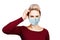 Young woman thinking wearing protective face mask prevent virus infection, pollution, white isolated background