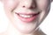 Young woman with toothy smile close-up