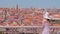 Young Woman tourist in hat enjoying cityscape of Porto City.