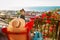 Young woman tourist relax on scenic balcony terrace