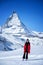 Young Woman Tourists see beautiful view of snow mountain Matterhorn peak, Zermatt, Switzerland