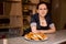 Young woman with traditional russian cakes