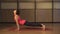 Young woman training yoga - upward facing dog