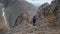 Young Woman Traveler Hiking around Mountains