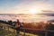 Young woman travelers looking at the sunrise and the sea of mist on the mountain in the morning, Travel lifestyle