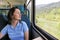 Young woman travelling by train