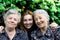 Young woman with two senior ladies