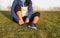 Young woman tying shoelace of sneakers to make outwork training running. Fitness and healthy lifestyle