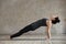 Young woman in Upward Plank pose