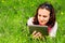 Young woman using tablet and relaxing in nature